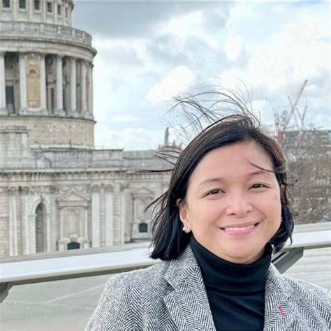 Dr. ADELA ROXAN VIRAY.